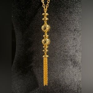 Joan Rivers Glamour 30 inch gold tassel necklace.